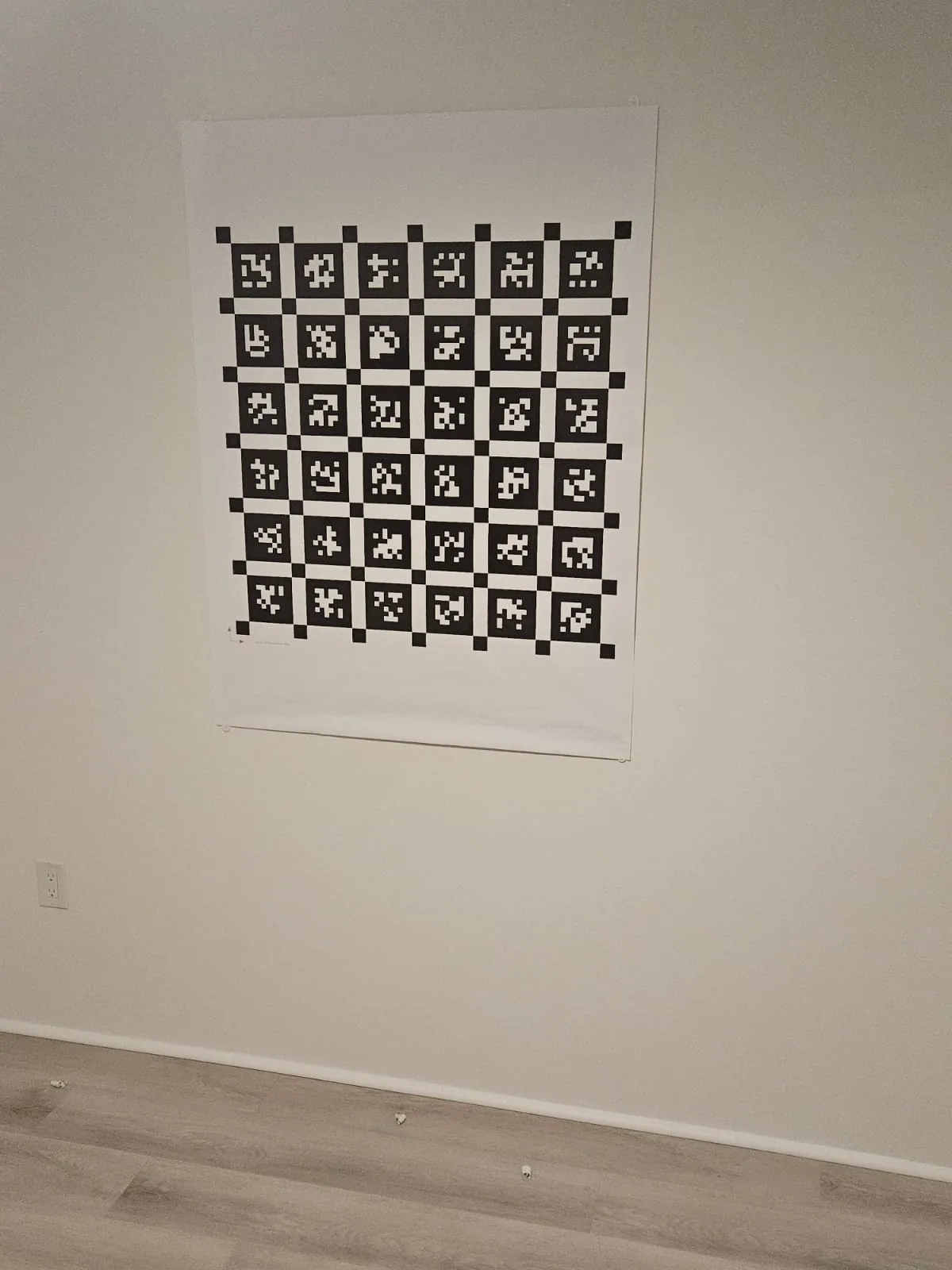 The April tag target printed and hung on a wall