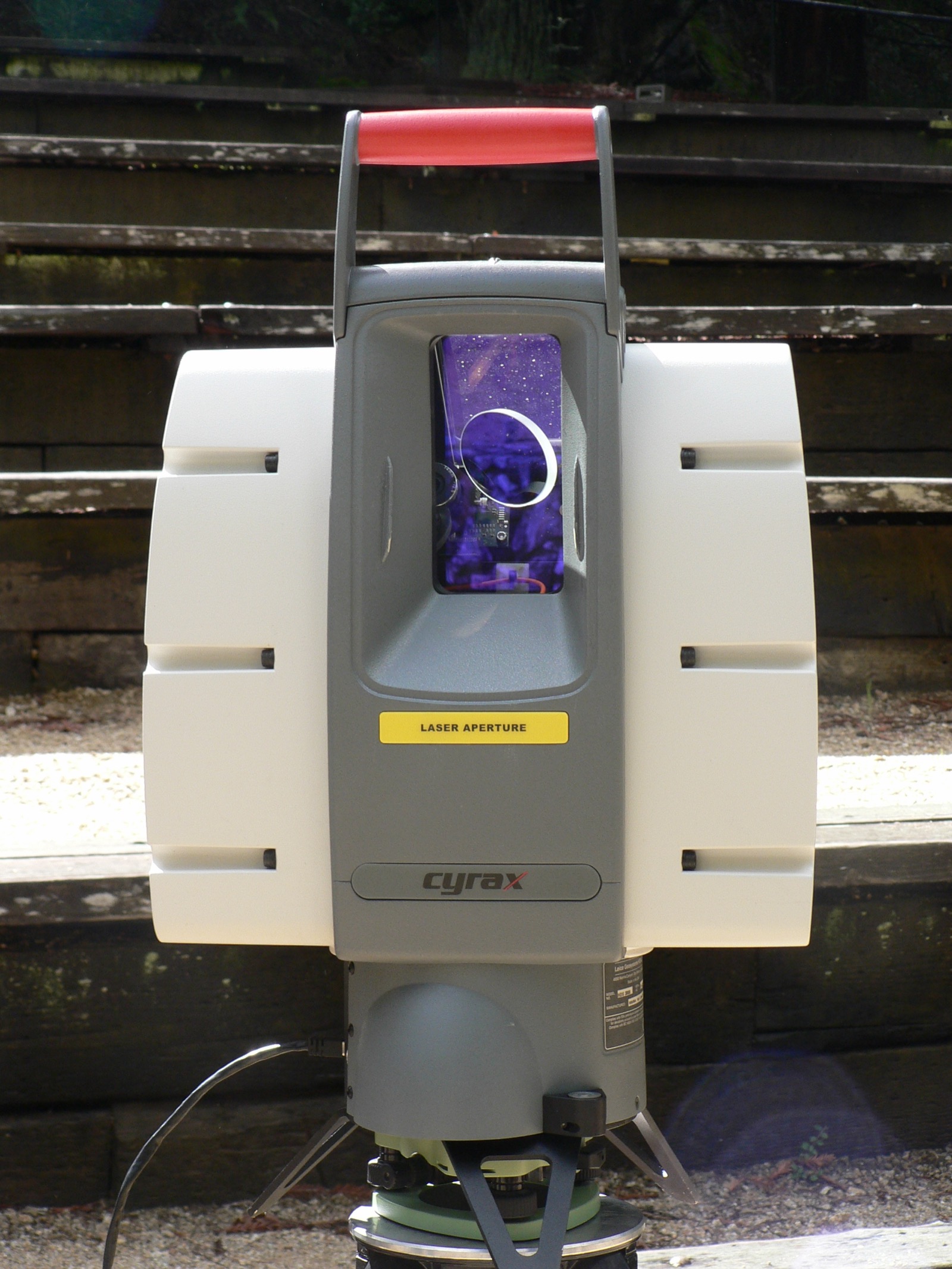Close-up of a terrestrial LiDAR laser scanner head with rotating mirror