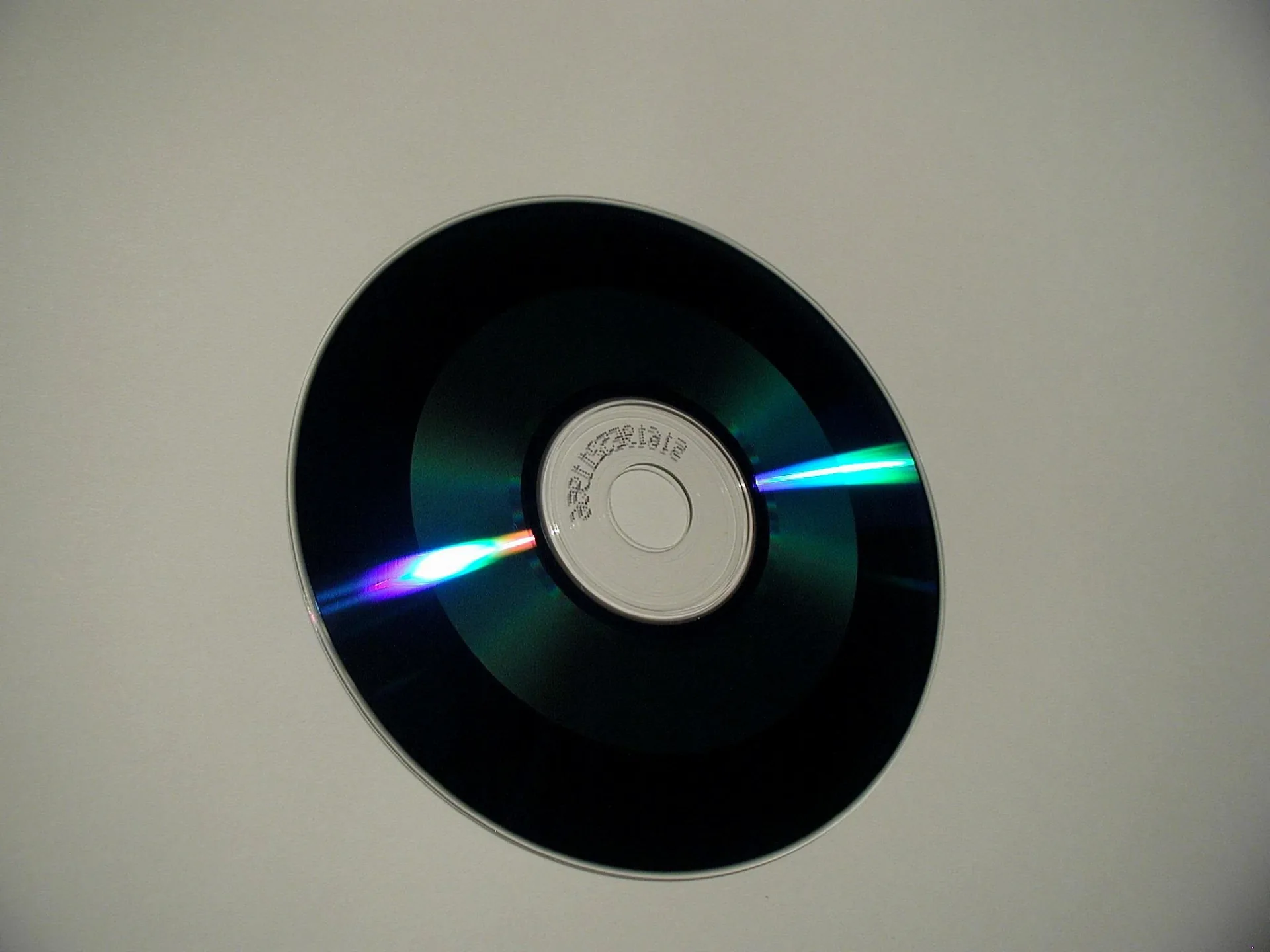 The reflective underside of an optical video disc