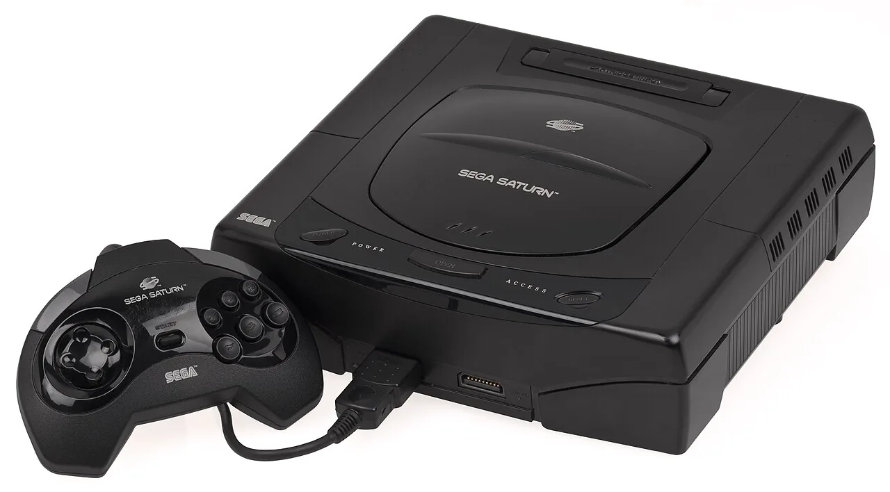 A Sega Saturn console with its controller